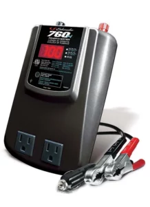 Schumacher Electric 760 volt power converter with dual outlets and color-coded clamps.