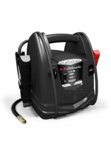 Schumacher Electric 1000 peak amp 12 volt jump starter with handle and color-coded clamps.