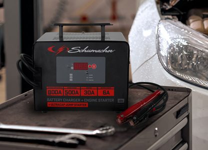 Schumacher battery charger on a work bench