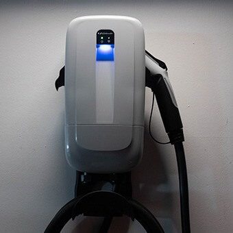 Electric vehicle charger on wall
